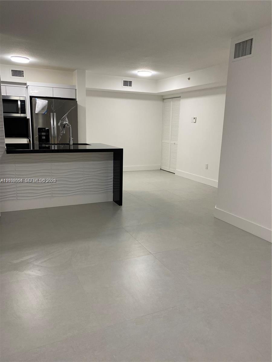 15480 Southwest 284th Street, Unit 2203 Homestead, FL 33033 - Photo 7 of 13 a view of an empty room