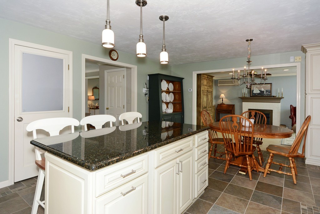 19 Lanthorn Road Northborough, MA 01532 - Photo 12 of 30 a kitchen with granite countertop a sink and chandelier