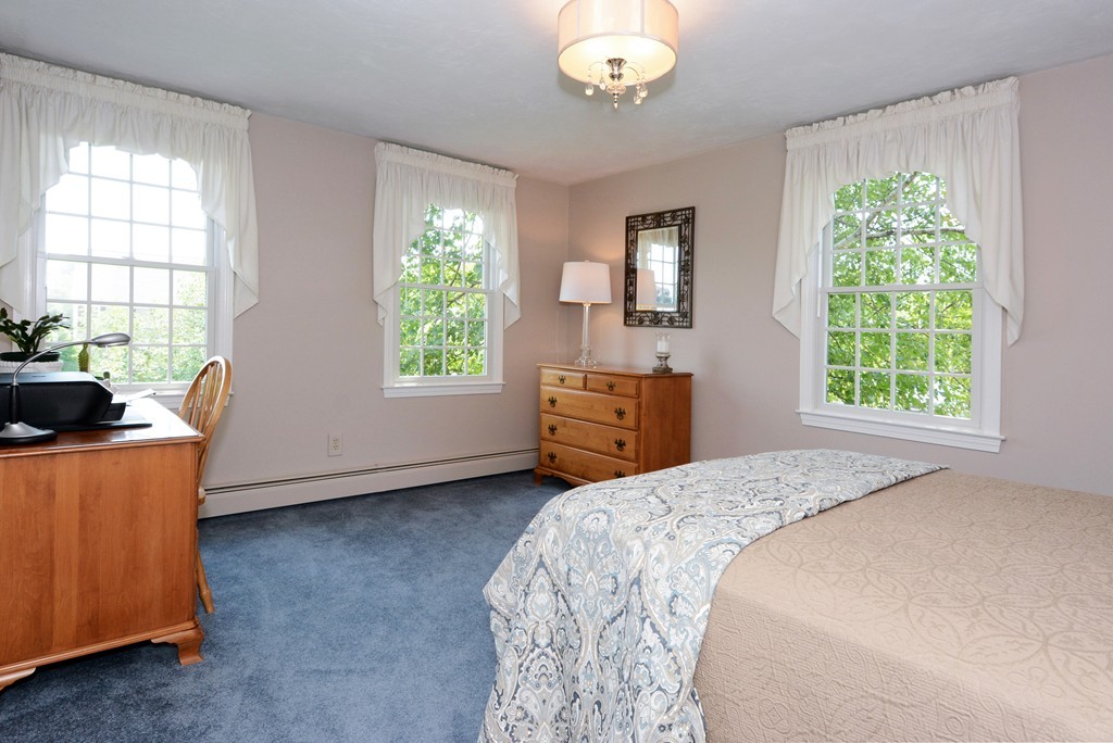 19 Lanthorn Road Northborough, MA 01532 - Photo 22 of 30 a bedroom with a bed dresser and a window