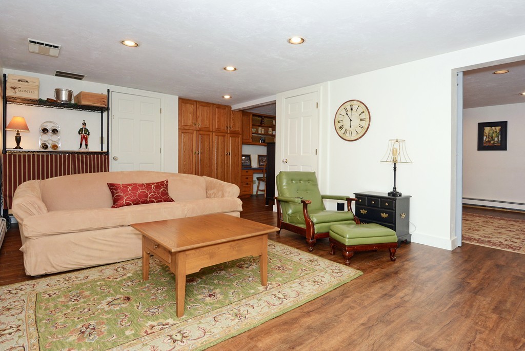 19 Lanthorn Road Northborough, MA 01532 - Photo 26 of 30 a living room with furniture and a flat screen tv