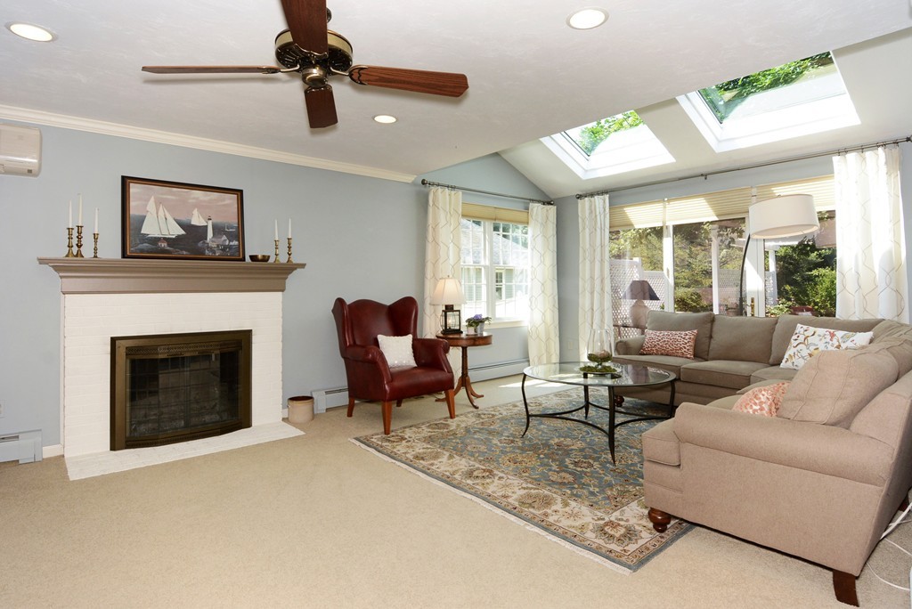 19 Lanthorn Road Northborough, MA 01532 - Photo 5 of 30 a living room with furniture and a fireplace