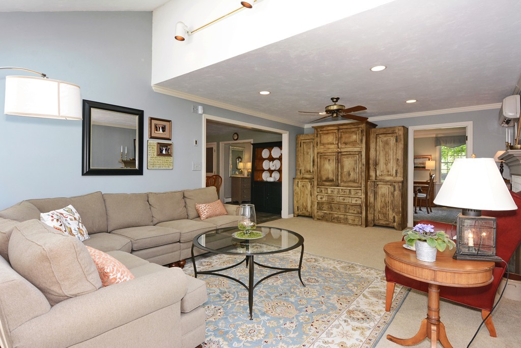19 Lanthorn Road Northborough, MA 01532 - Photo 6 of 30 a living room with furniture and a lamp
