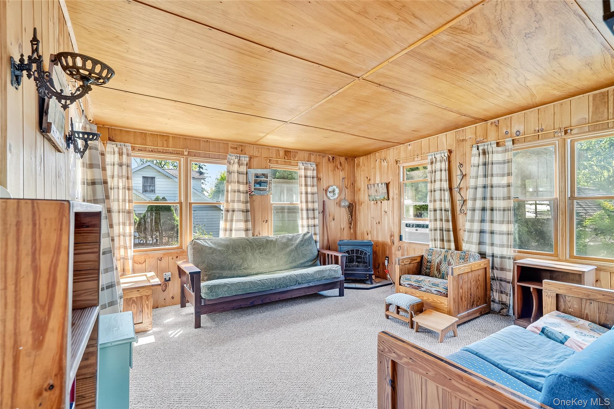 5 Orchard Road North Salem, NY 10509 - Photo 26 of 47 Sunroom / solarium with healthy amount of natural light and a wood stove