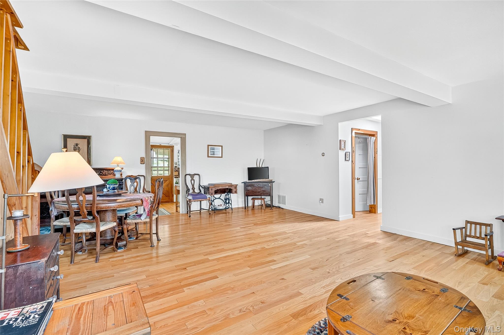 5 Orchard Road North Salem, NY 10509 - Photo 9 of 47 Living area with light wood-style flooring and beamed ceiling