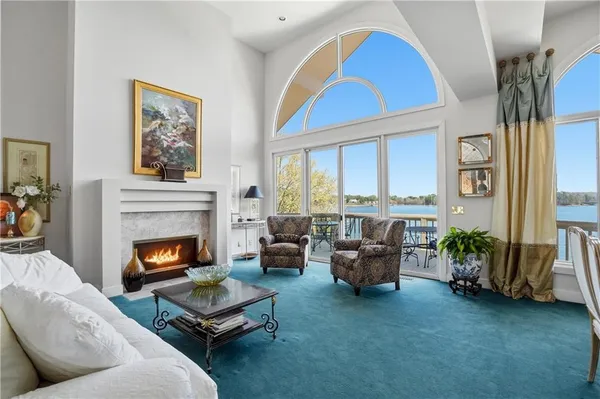 a kitchen with stainless steel appliances granite countertop sink stove and refrigerator