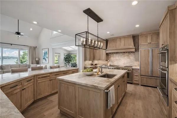 a dining room with furniture and a window