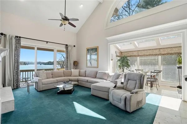 a bathroom with a sink a toilet and shower curtain