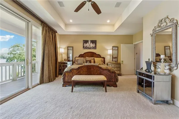 a kitchen with a sink appliances and cabinets