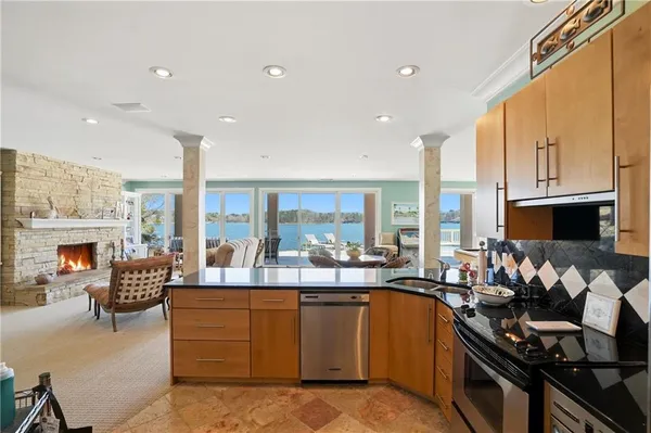 a view of walk in closet with clothes