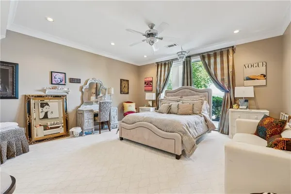 a view of a house with swimming pool and sitting area