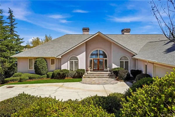 a view of a terrace with a lake view