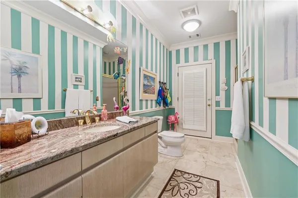 an aerial view of a house with swimming pool garden and patio