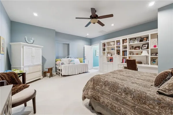 an aerial view of a house with a yard and garden