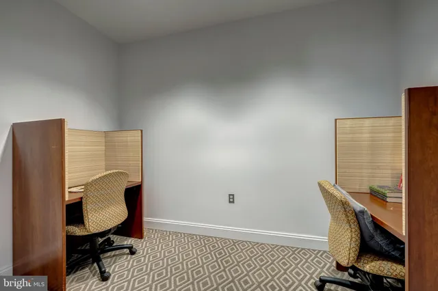 a view of workspace and bedroom