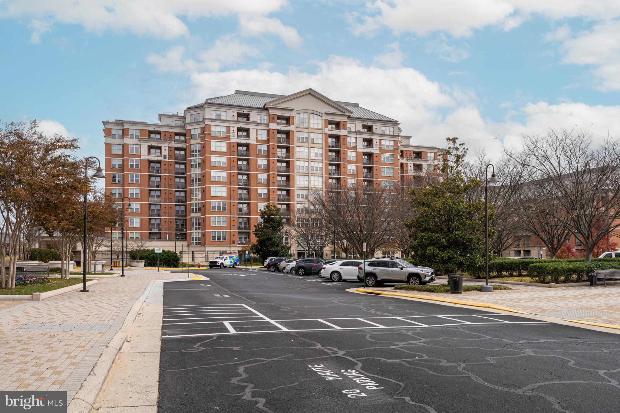 11770 Sunrise Valley Drive, Unit 321 Reston, VA 20191 - Photo 35 of 36 a parked cars parked in front of a building