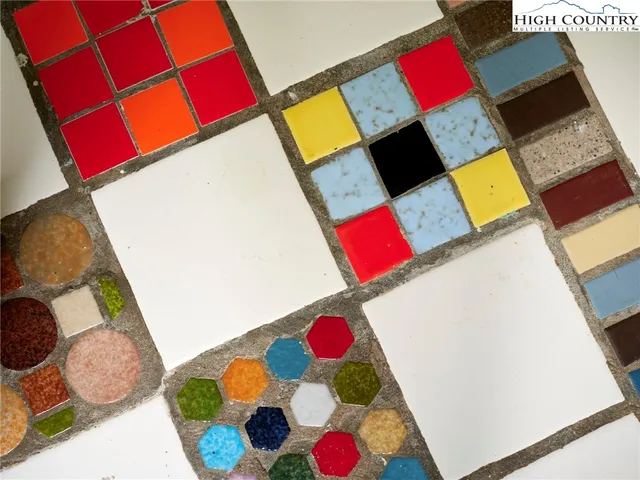 a view of living room with furniture and a rug