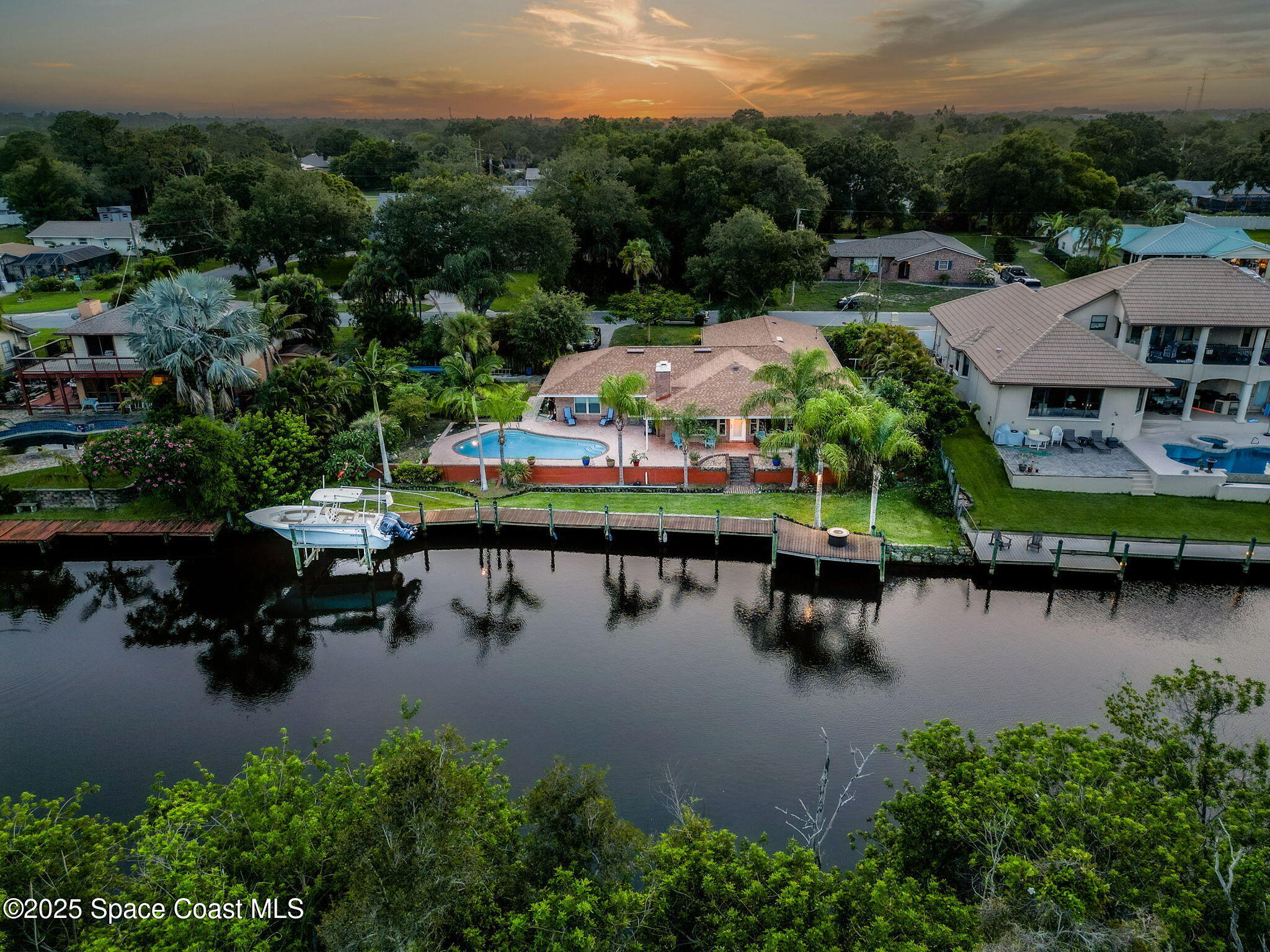 1021 Sunswept Road Northeast Palm Bay, FL 32905 - Photo 1 of 41 27-web-or-mls-Twilight-7