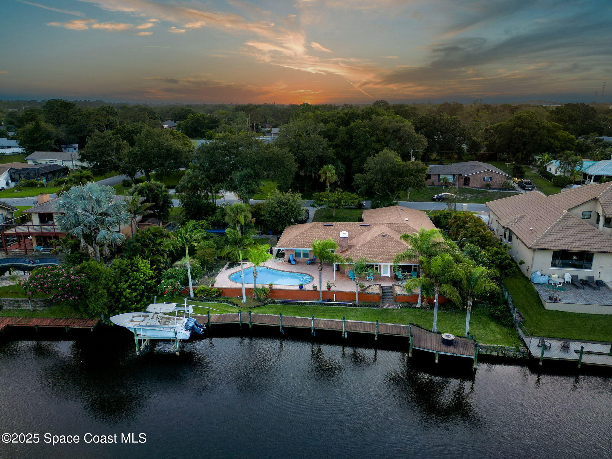 1021 Sunswept Road Northeast Palm Bay, FL 32905 - Photo 28 of 41 26-web-or-mls-Twilight-6