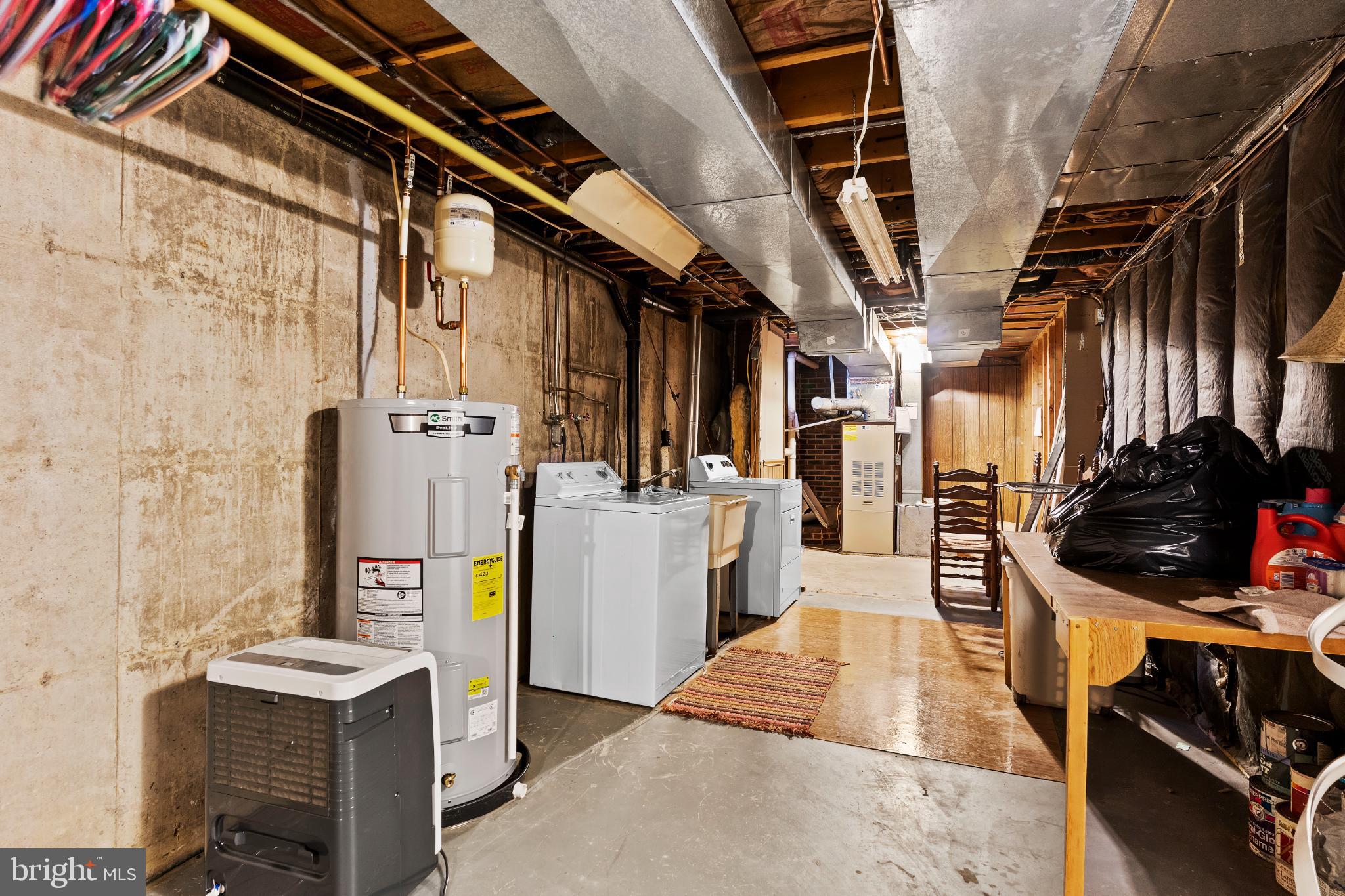 1434 Yorktowne Road Mechanicsburg, PA 17050 - Photo 18 of 30 Spacious basement with laundry amenities.