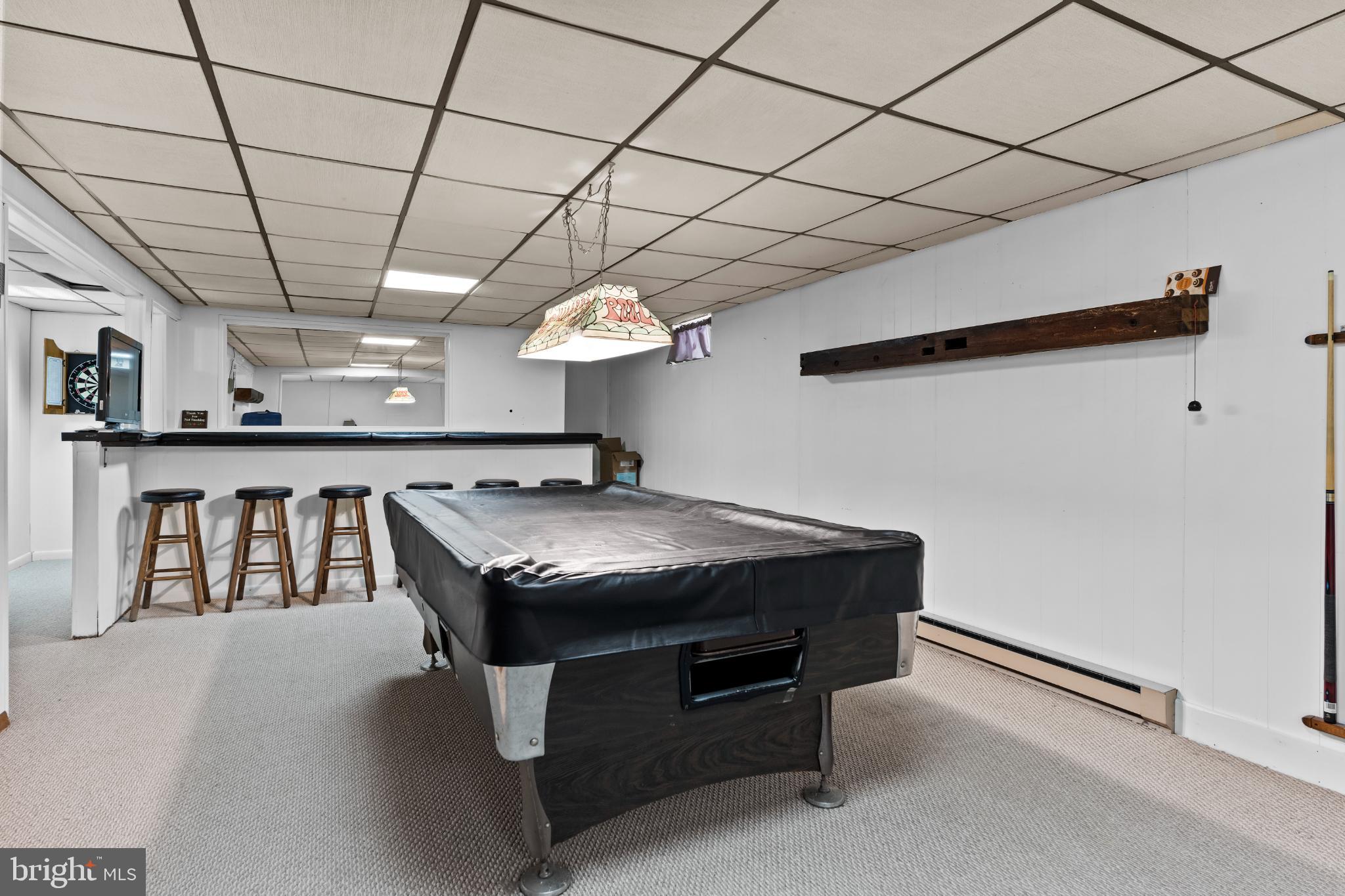 1434 Yorktowne Road Mechanicsburg, PA 17050 - Photo 26 of 30 Spacious game room with bar and pool table.