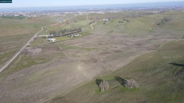 an aerial view of mountain with beach