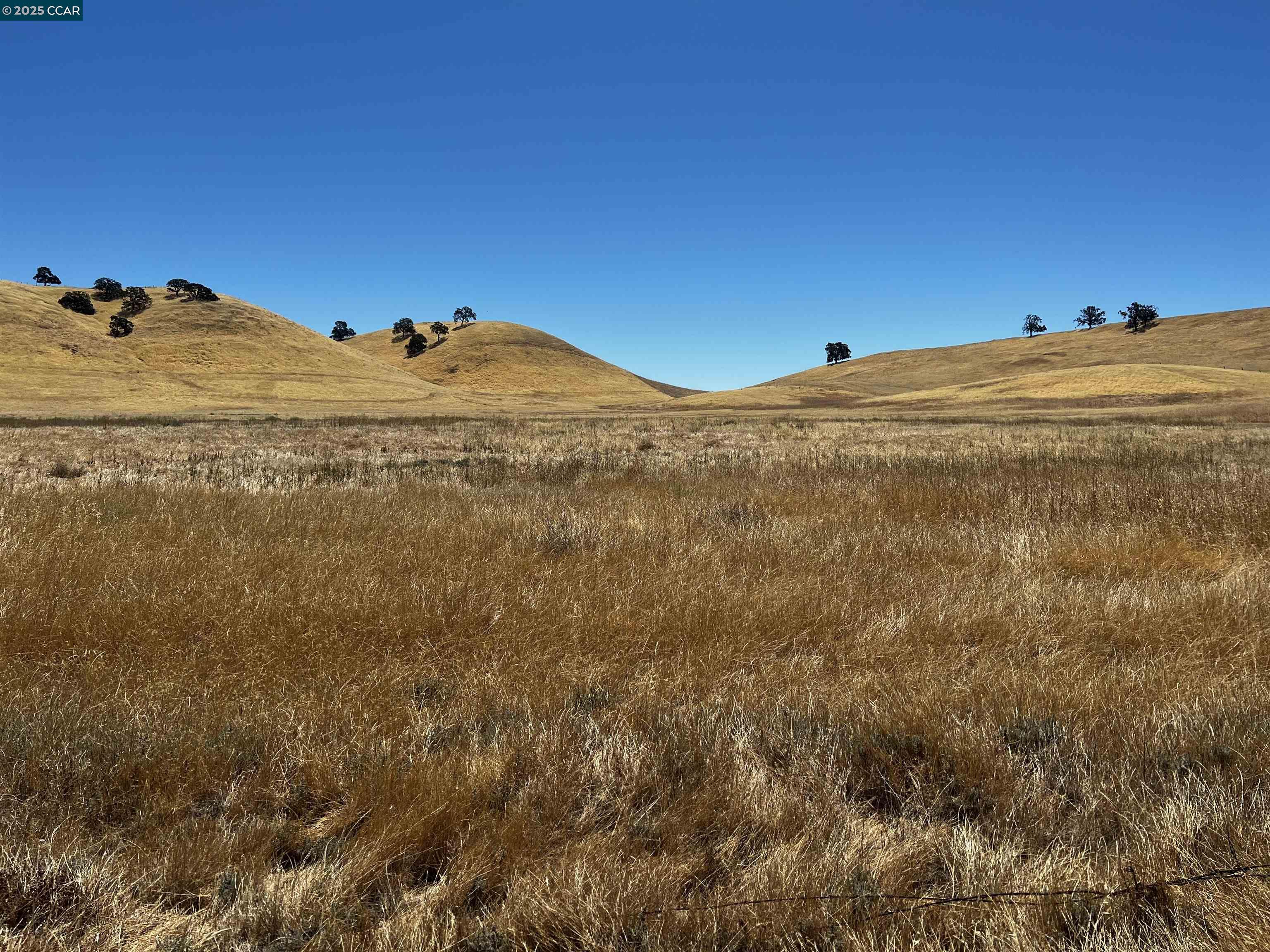 0 Briones Valley Road Brentwood, CA 94513 - Photo 41 of 48 a view of a large building with mountain in the background