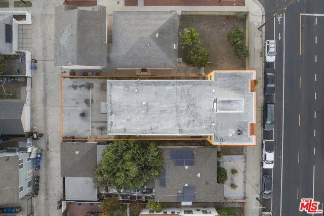 an aerial view of residential house with outdoor space