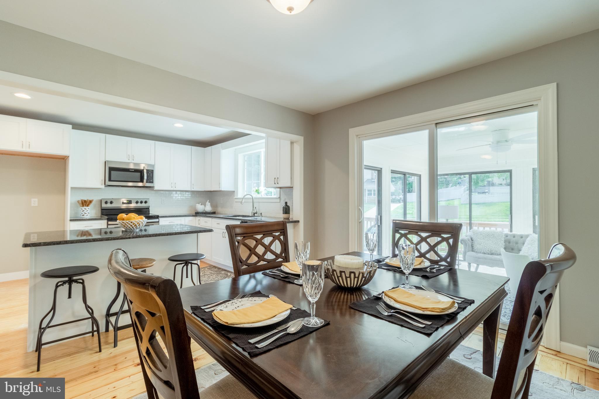 38 Vansant Road Newark, DE 19711 - Photo 12 of 42 Formal Dining Room with Access to Sun Room & Deck