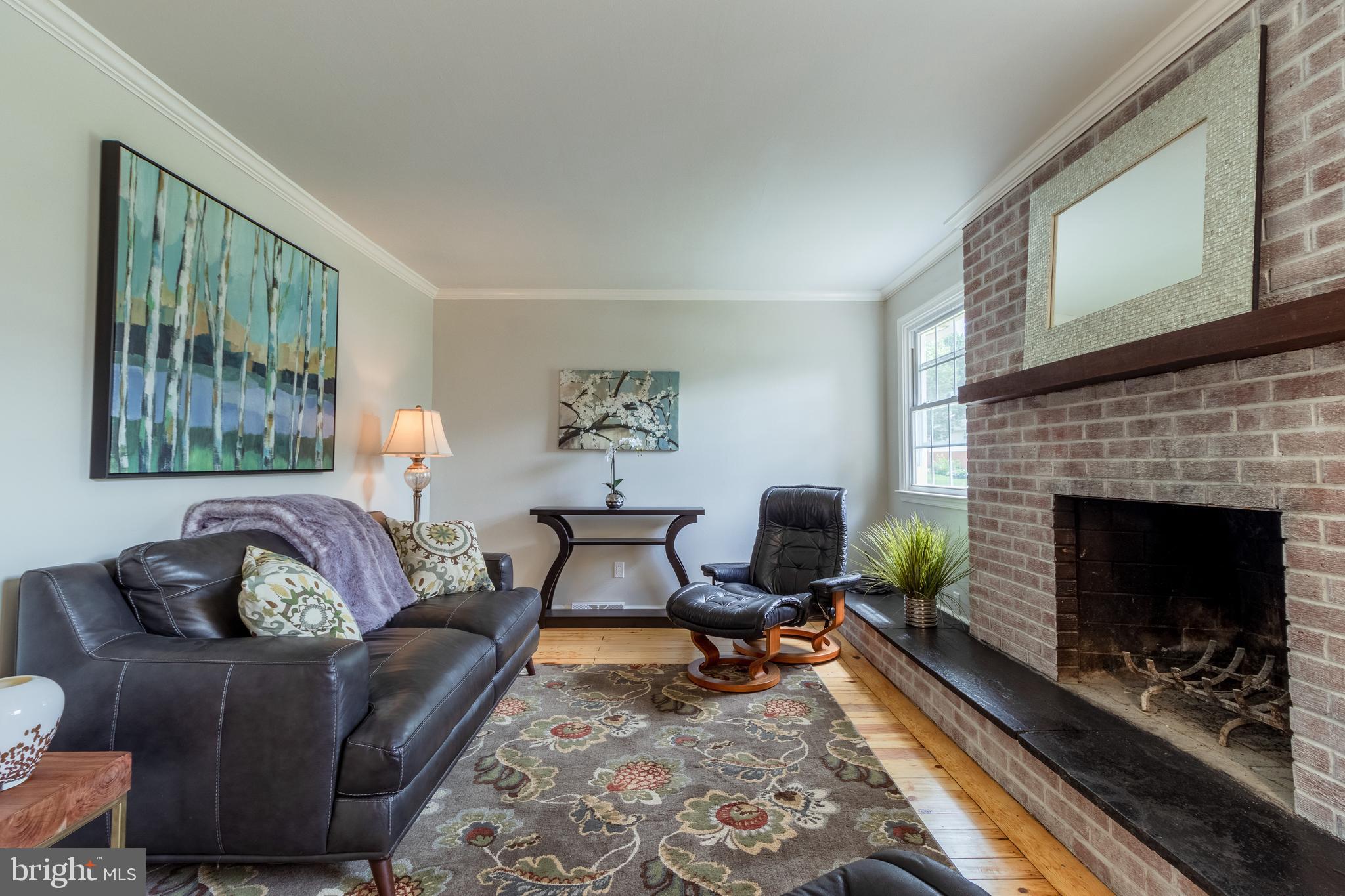 38 Vansant Road Newark, DE 19711 - Photo 20 of 42 Family Room with Brick Wood Burning Fireplace
