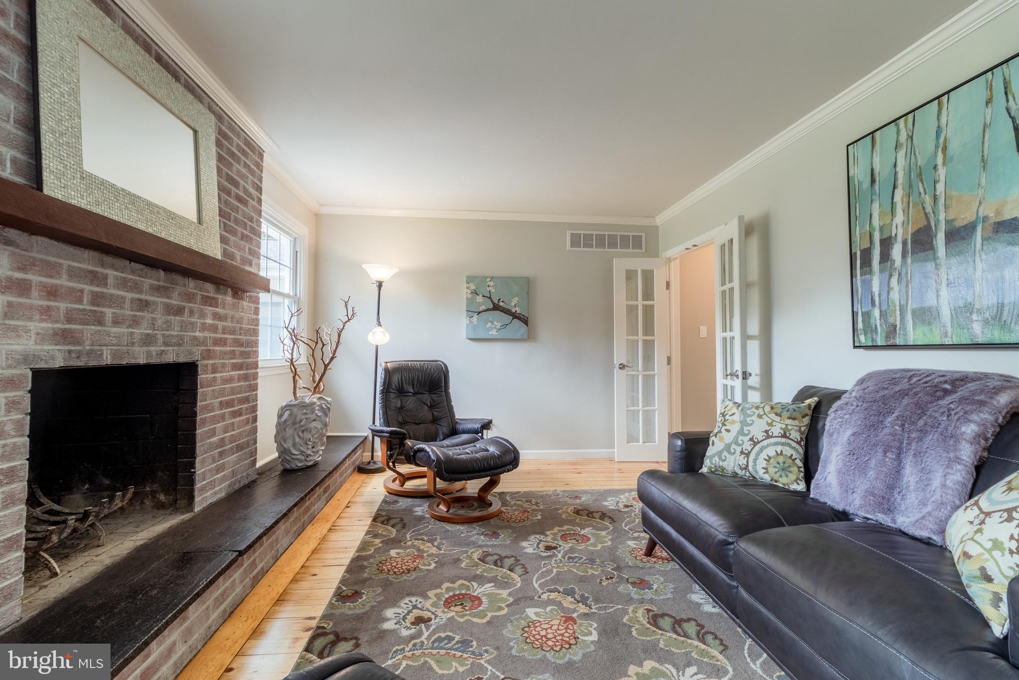 38 Vansant Road Newark, DE 19711 - Photo 21 of 42 Family Room with Brick Wood Burning Fireplace