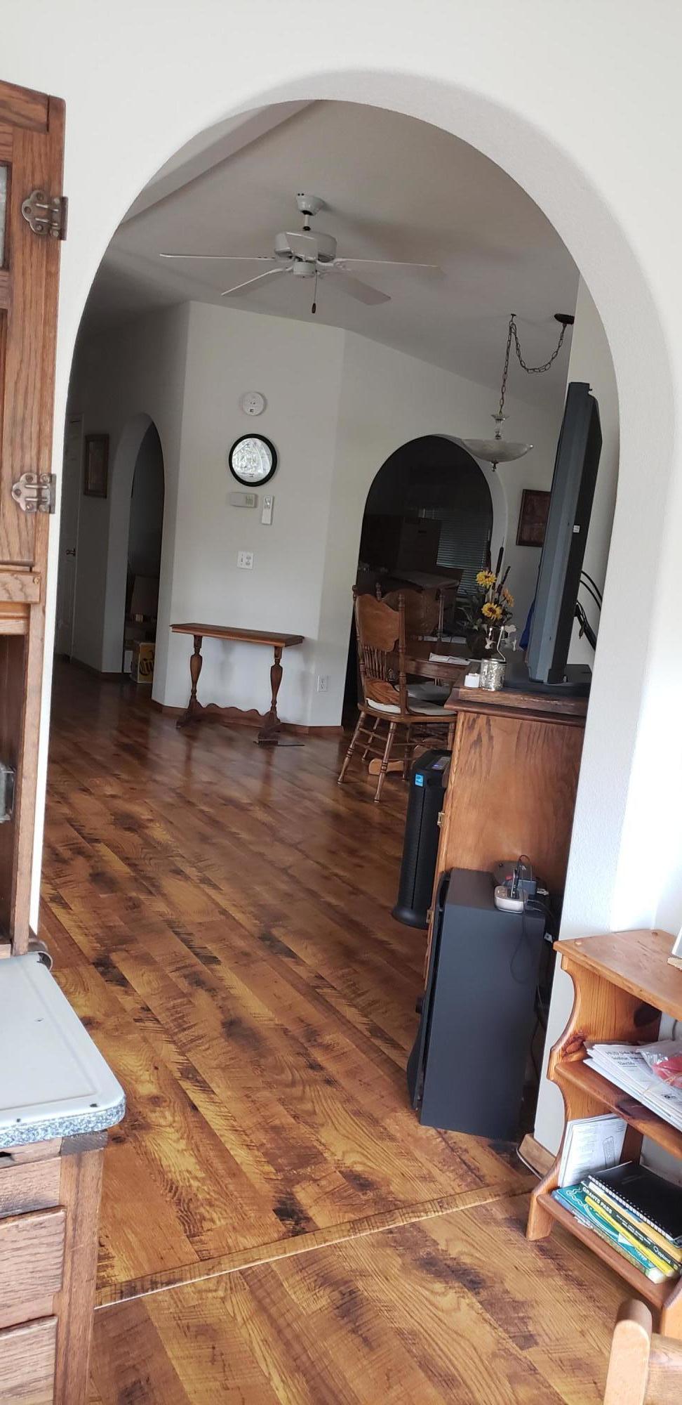 From breakfast nook to living room. arched doorways.
