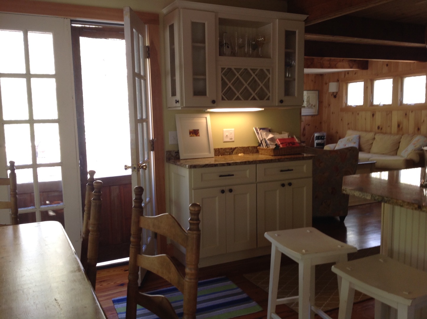 39 Tower Ridge Road Oak Bluffs, MA 02557 - Photo 11 of 33 Kitchen cabinet and door from deck to dining room
