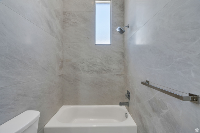 7045 South 300 East Midvale, UT 84047 - Photo 28 of 49 Bathtub and shower combination with full-height large format tile surround