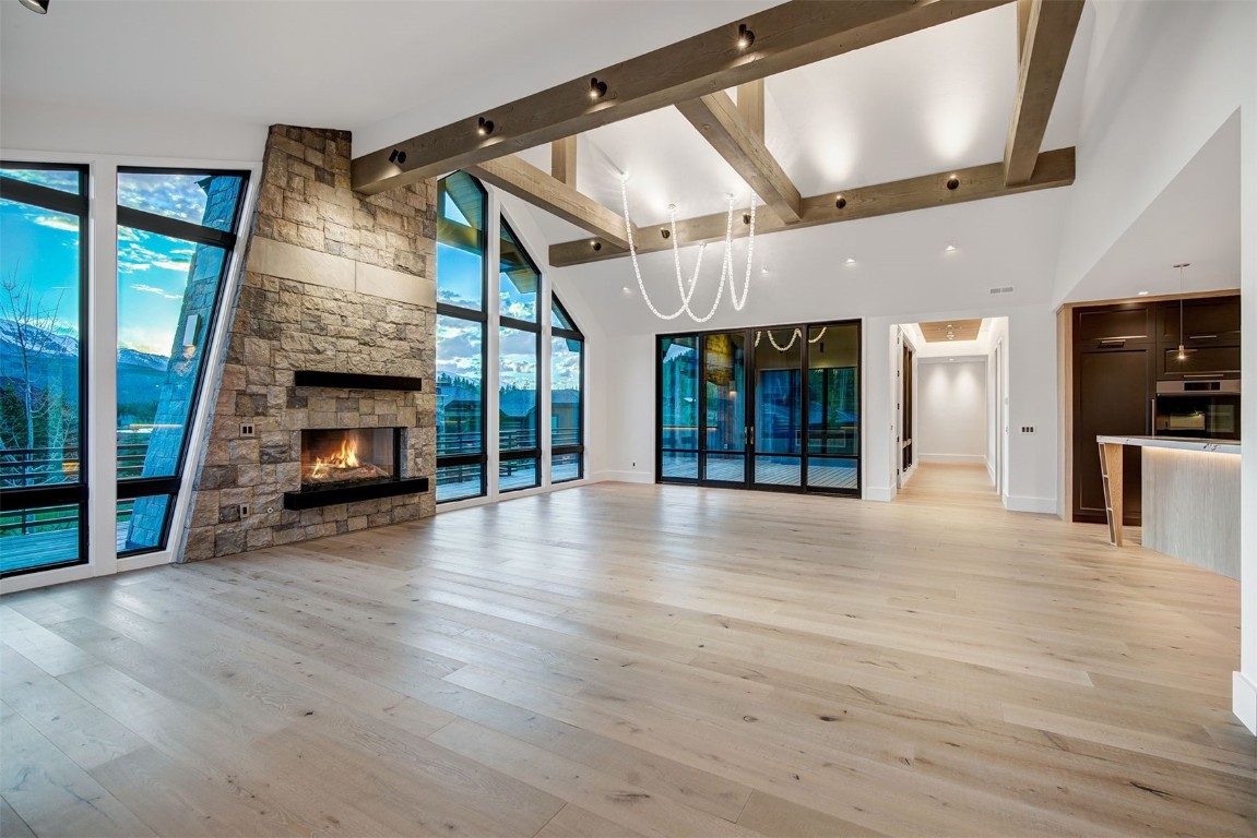 294 Gold Run Road Breckenridge, CO 80424 - Photo 15 of 50 a view of livingroom with furniture wooden floor fire place and windows