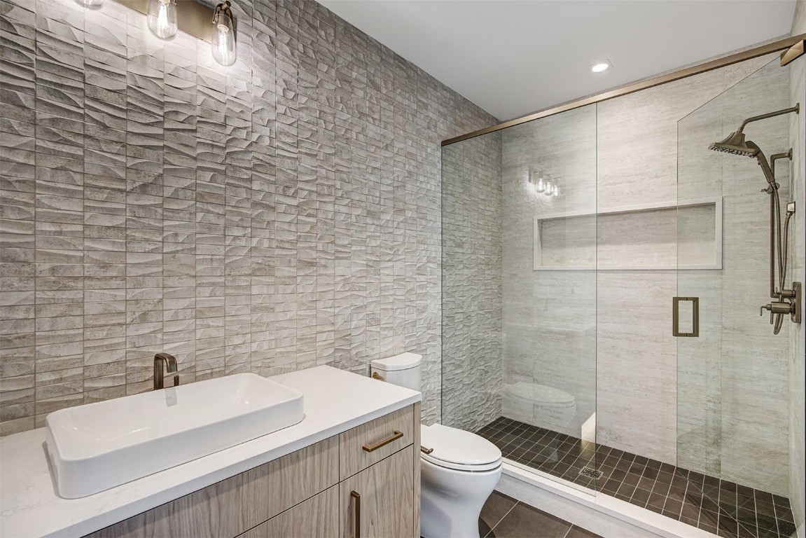 294 Gold Run Road Breckenridge, CO 80424 - Photo 29 of 50 a bathroom with a sink a toilet and shower