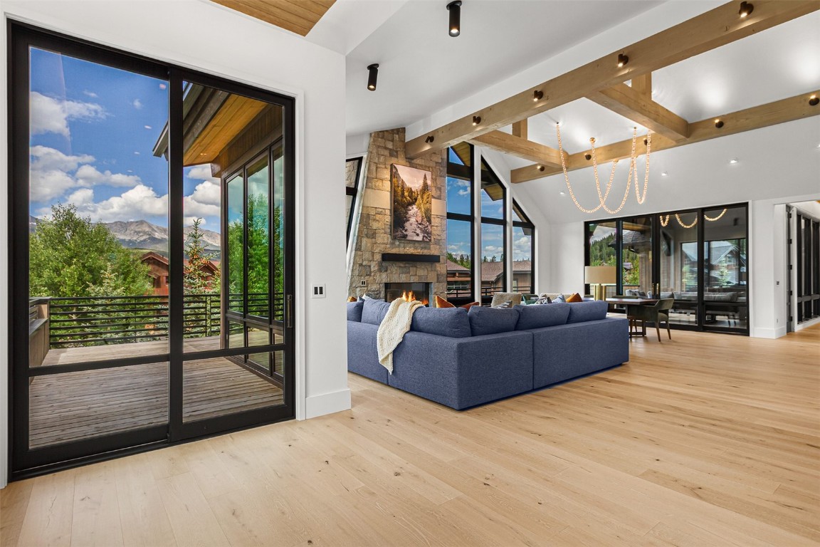 294 Gold Run Road Breckenridge, CO 80424 - Photo 4 of 50 a living room with furniture and a floor to ceiling window