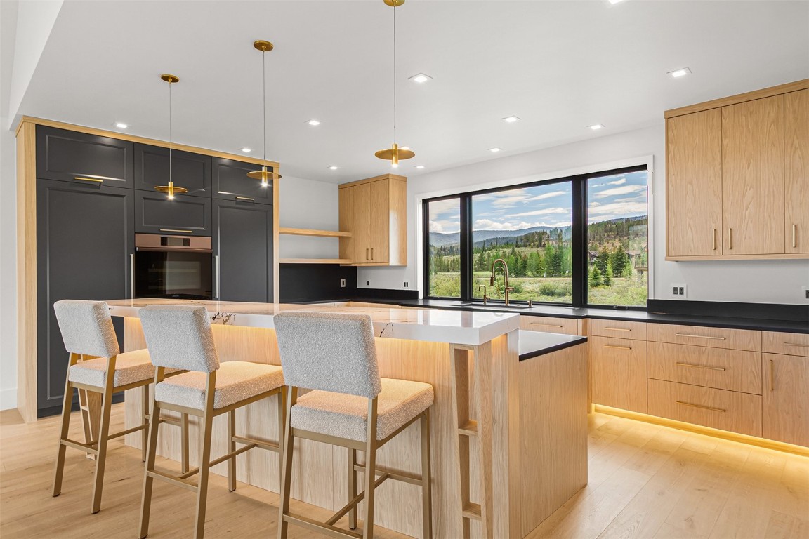 294 Gold Run Road Breckenridge, CO 80424 - Photo 8 of 50 a dining hall with stainless steel appliances granite countertop furniture and a large window