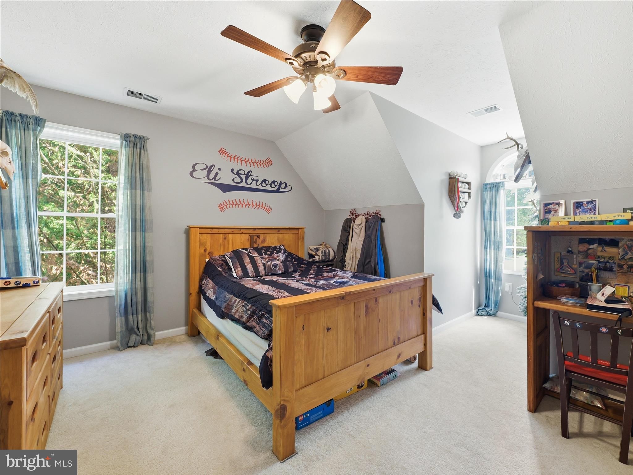 726 Doe Run Road Inwood, WV 25428 - Photo 52 of 68 a bed room with a bed and a book shelf