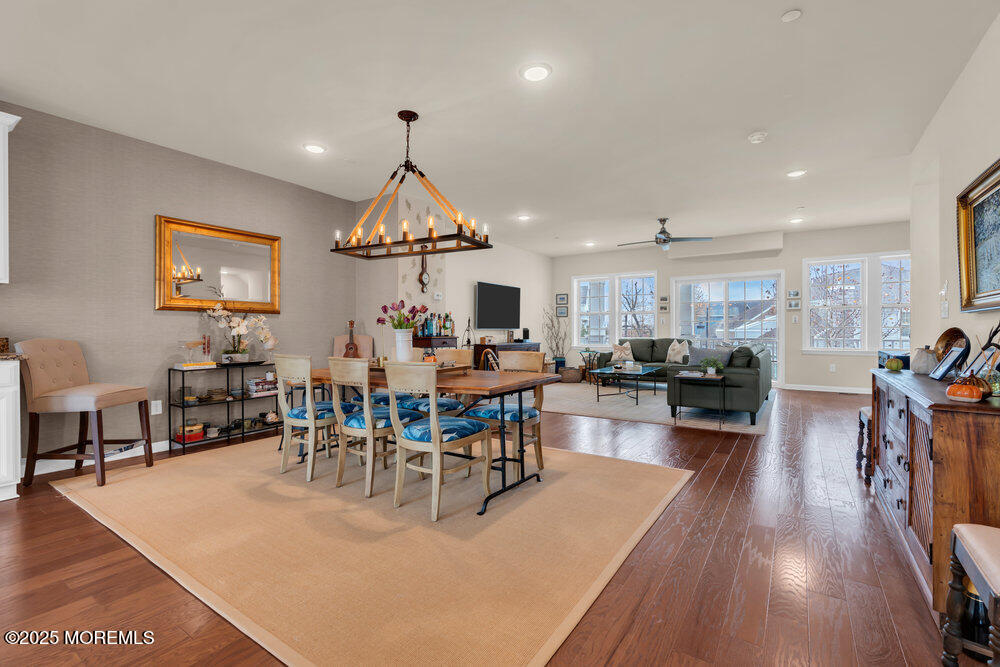 24 Lighthouse Point Road Highlands, NJ 07732 - Photo 20 of 63 a view of a dining room with furniture a rug and wooden floor