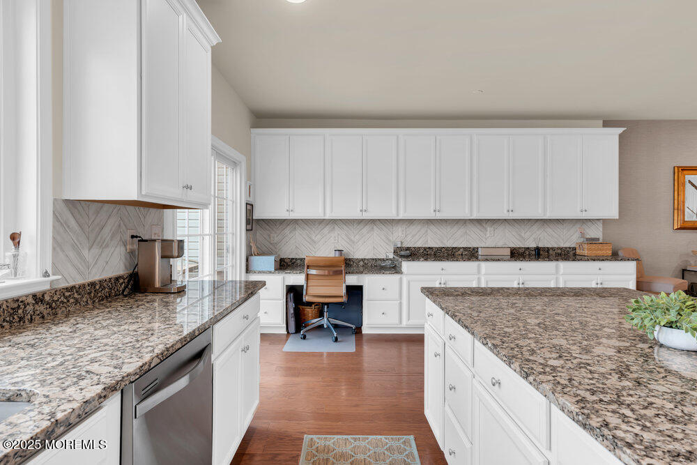 24 Lighthouse Point Road Highlands, NJ 07732 - Photo 29 of 63 a kitchen with granite countertop a sink stove and cabinets