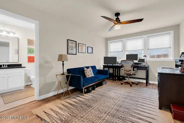 a view of a balcony with furniture