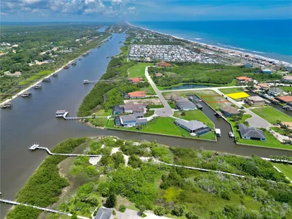 an aerial view of a house with a garden
