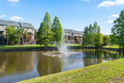 a view of a lake with a building in the background