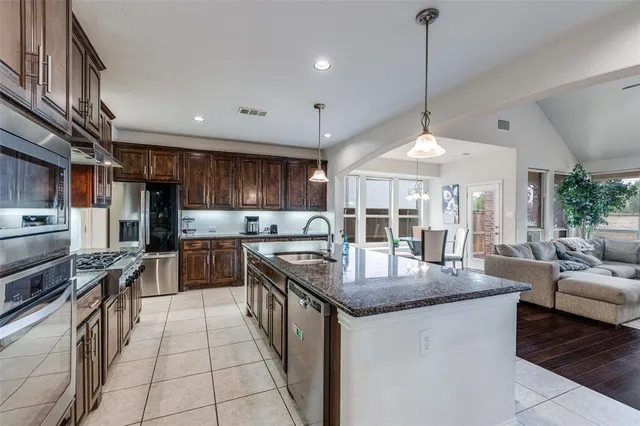 a bedroom with a bed chair and ceiling fan