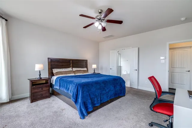 a spacious bathroom with a granite countertop sink mirror and a