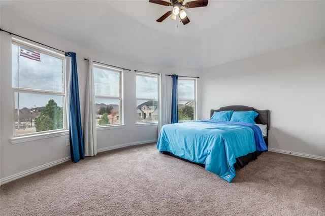 a bathroom with a sink toilet and a mirror