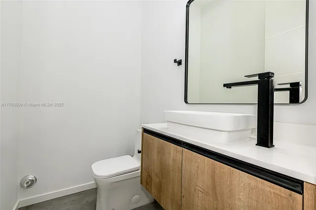 a bathroom with a sink and a toilet