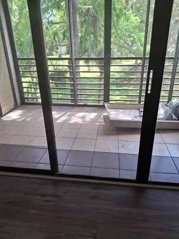 a view of lot of trees from a window