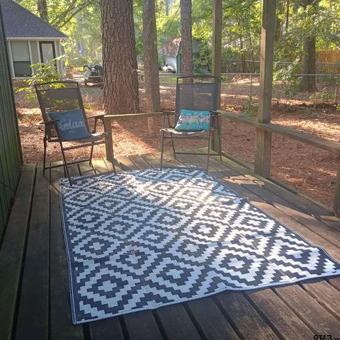 a outdoor space with lots of potted plants