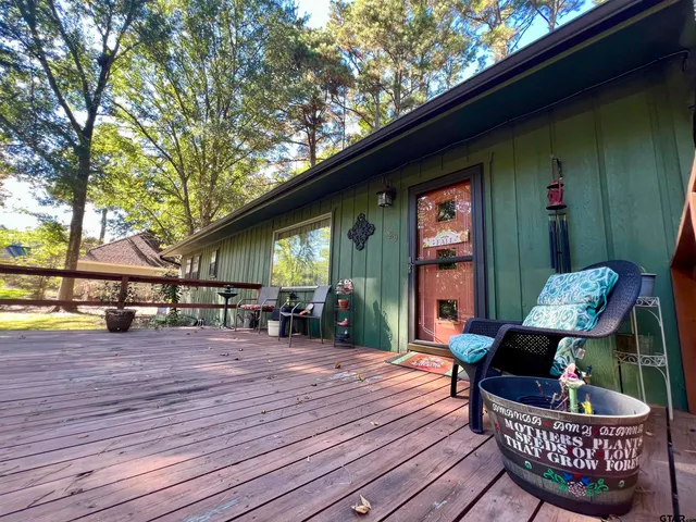 a view of a chairs and tables in the balcony